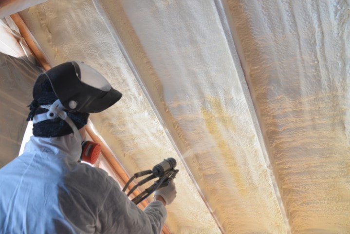 spray foam insulation being sprayed